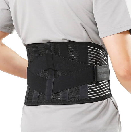 Person wearing a black back brace on a white background