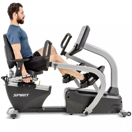 Man using a Spirit exercise machine on a white background