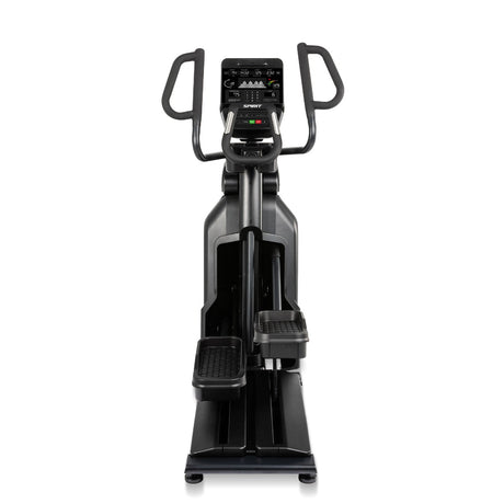 Black exercise bike with digital display on a white background