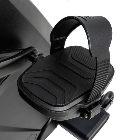 Black motorcycle phone mount on a motorcycle handlebar