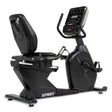 Black exercise bike with digital display on a white background, branded 'Spirit'.