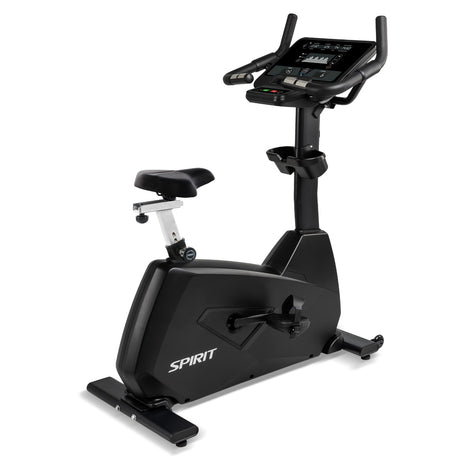 Black exercise bike with digital display on a white background, featuring the Spirit brand.