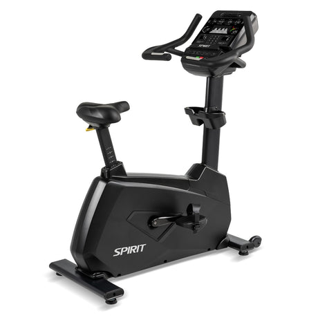 Black exercise bike with digital display on a white background, branded 'Spirit'.