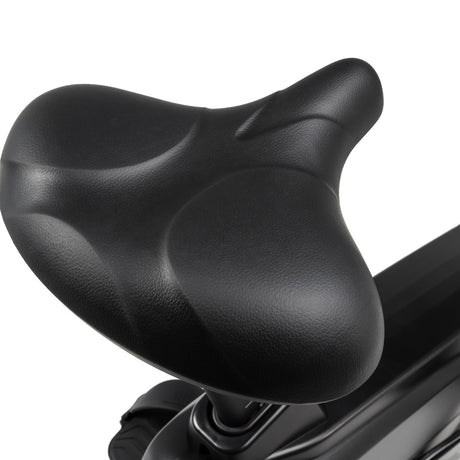 Close-up of a black bicycle seat on a white background