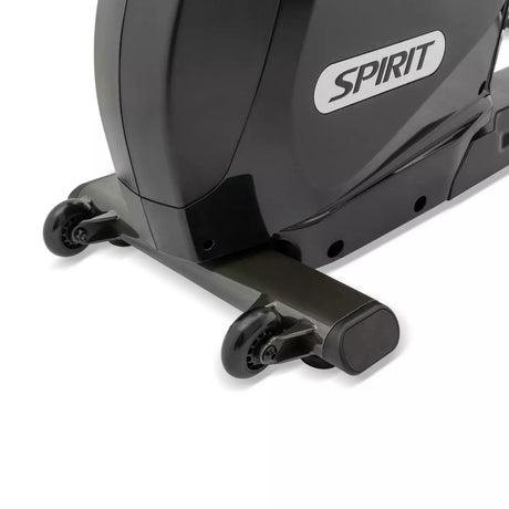 Close-up of a black exercise bike with 'Spirit' branding on a white background