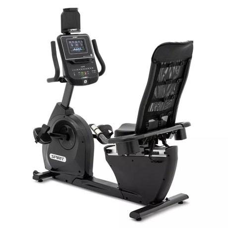 Black exercise bike with digital display on a white background