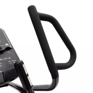 Close-up of a black exercise bike handlebar with a digital display on a white background